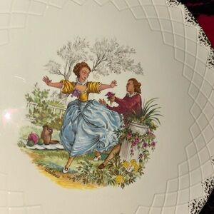 Vintage Ceranord Samand dinner plate with romantic scene.